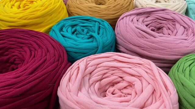 Close-up of multi-colored cotton skeins. Shop assortment for handmade