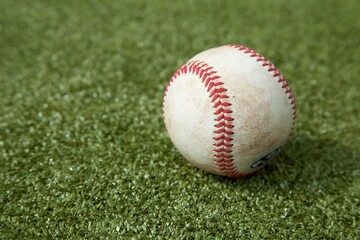 Baseball on field turf