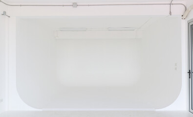 New and clean white photo studio room.