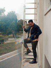 Man standing on stairs 