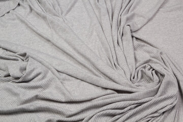 Texture of the fabric swirling in a whirlpool.  cloth background. Web article template. Long header banner format. Sale coupon. Visit card. Your information. Text space.