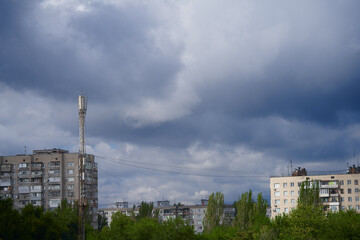 dramatic clouds descended over a European city