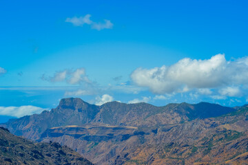 Fototapeta na wymiar Mountains of the island of Gran Canaria, originally - this is a volcano and the landscape was formed as a result of its activity