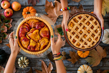 Homemade autumn pies at the hands of two women © studio GDB