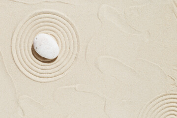Zen garden meditation sandy background  White stone and lines on sand