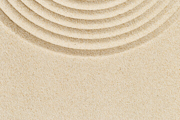 Fototapeta na wymiar Pattern in Japanese Zen Garden with close up concentric circles on sand Aesthetic minimal