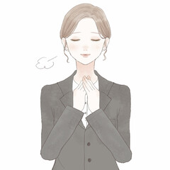 安心しているスーツを着た女性