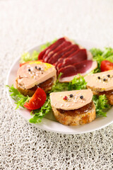 plate with toast of foie gras- french christmas cuisine