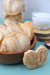 Palmiers cookie. Also known as elephant ear or Pig ear puff pastry cookies. classic French pastry. Sugar French Hearts. Copy space.
