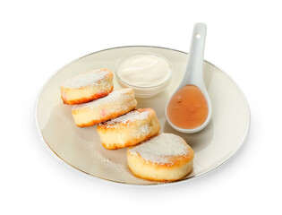 Plate with tasty cottage cheese pancakes, sour cream and honey on white background