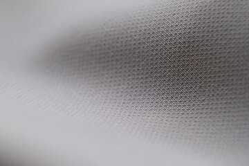 abstract texture of draped beige background. eautiful textile backdrop. Close-up. Top view. soft...