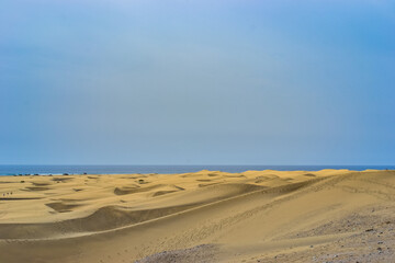 The Maspalomas Dunes are sand dunes located on the south coast of the island of Gran Canaria