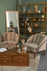 Vertical background image of elegant salon interior with comfy velvet armchairs and antique...