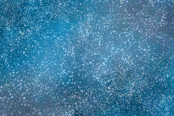 Abstract snowfall background. Blue sky with snow. Galaxy space background.