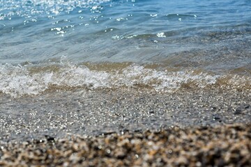 Wave of the Sea on a Beach