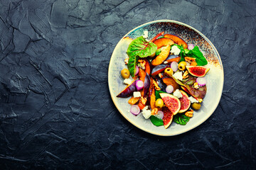 Fresh salad with plums and figs,space for text
