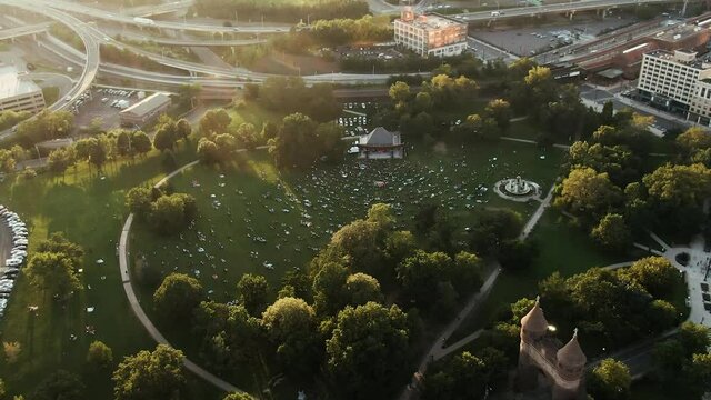 People gathered at show in Bushnell park in Hartford city during sundown
