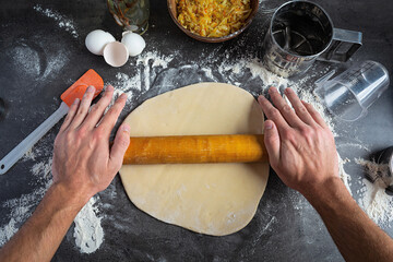Homemade making dough of pizza, pierogi. Preparation dough for cooking