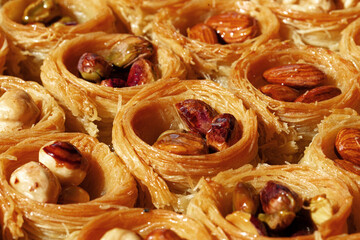 Background of traditional arabic dessert Baklava with honey and nuts