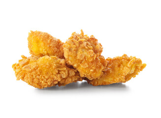 Crunchy popcorn chicken on white background