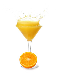 Glass of tasty orange margarita with splashes on white background