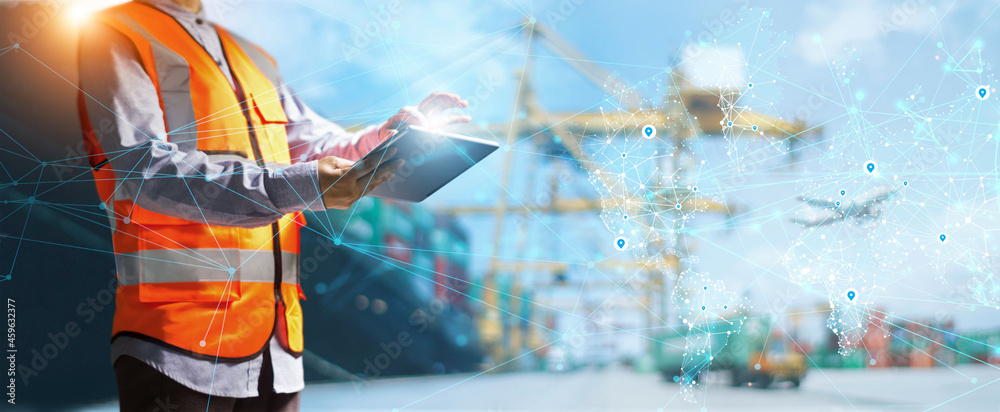Fototapete Logistic and transport. Industrial of global logistic network distribution. Worker use digital tablet data exchanges customer on world map networking. Fast instant shipping of online goods orders.