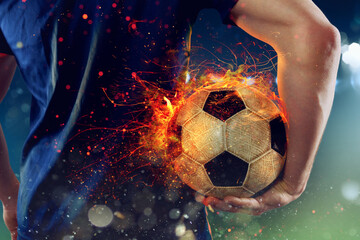 Soccer player ready to play with fiery soccerball