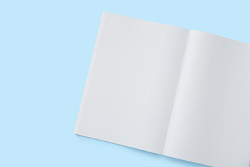 Blank magazine on blue background