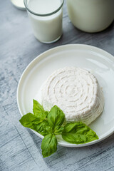 fresh ricotta with basil leaf and tomato
