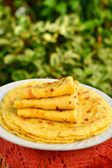 Bakery. Home made pancakes with   organic free range  eggs and white cheese on wooden background. Rustic style breakfast