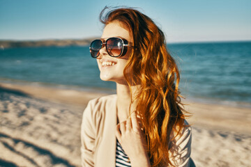woman wearing sunglasses summer nature fresh air ocean travel