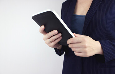 Concept of technology, connection, communication, social. Businesswoman hand using digital tablet. Hands Holding A Tablet Touch Computer. Digital marketing.