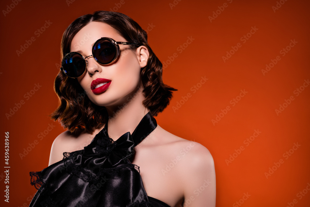 Wall mural photo of attractive young charming stunning woman wear glasses october dress witch isolated on dark 