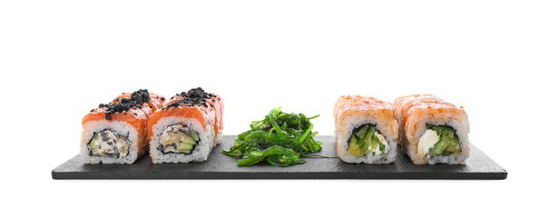 Delicious sushi rolls and chuka on white background