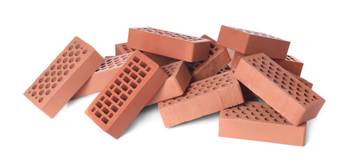 Pile of red bricks on white background. Building material