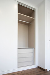 Fototapeta na wymiar new modern cabinet with internal drawers
