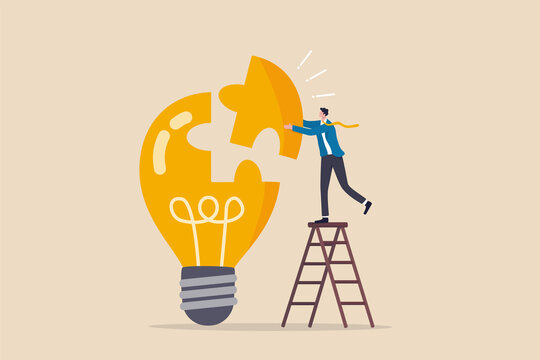 Solve business problem with creativity, finishing or complete brilliant idea, work solution or business idea concept, smart businessman assemble last piece of jigsaw to complete lightbulb idea puzzle.