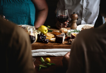 People enjoying a cheese platter food photography recipe idea