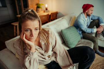 Obraz premium Pretty Caucasian woman upset after with boyfriend at home