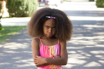 Portrait of an angry multiracial girl	