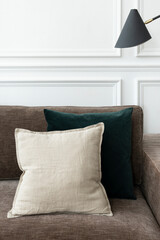 Minimal cushion cover in white on a sofa