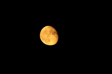 yellow moon in the black sky