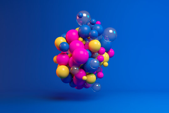Three dimensional render of colorful spheres floating against blue background
