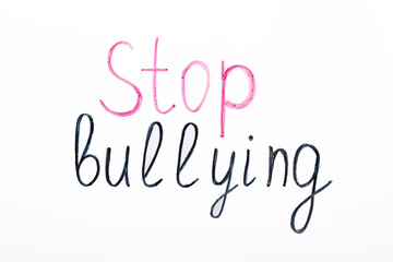 Fototapeta na wymiar Phrase Stop Bullying written on white background