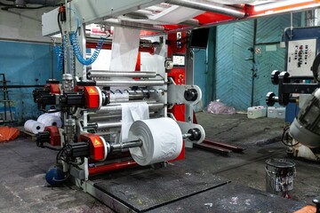 Material on automatic machine for the manufacture of medical masks with nanofiber. Coronavirus Covid-19