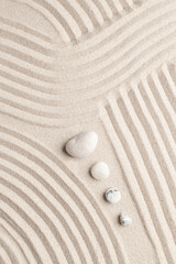 Fototapeta na wymiar Zen marble stones sand background in peace concept
