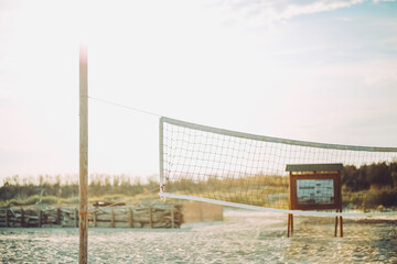 Fototapeta premium Beach Volleyball in sunset. Evening atmosphere.