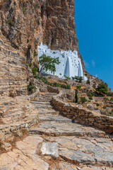 The famous Hozoviotissa Monastery standing on a rock over the Aegean sea in Amorgos island,...