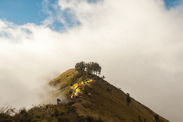 Colorful tents on mountaintop of Mount Rinjani, Lombok, Indonesia