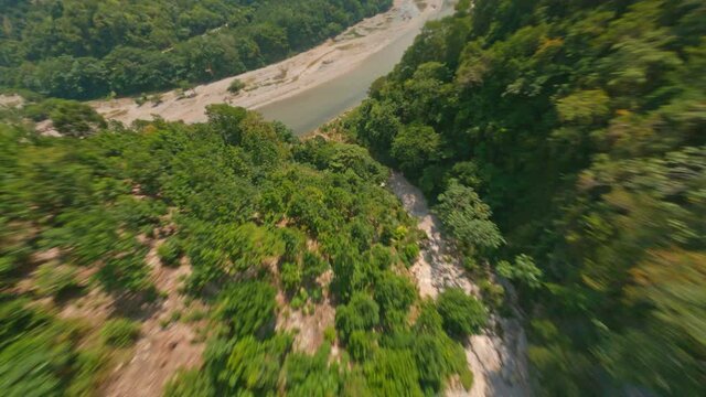 Steep Rugged Lush Forest Mountains With Freshwater Stream Flowing At Muchas Aguas In Dominican Republic. FPV
